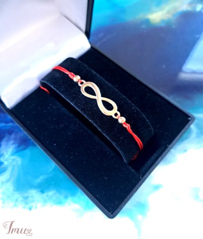 imusau.lt | parduodama Raudono siūlo apyrankė su begalybės ženklu